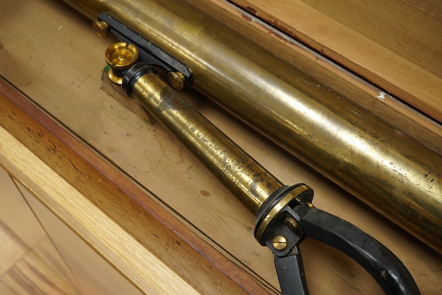 A cased brass telescope and stand, early 20th century, telescope 98cm long. Condition - fair